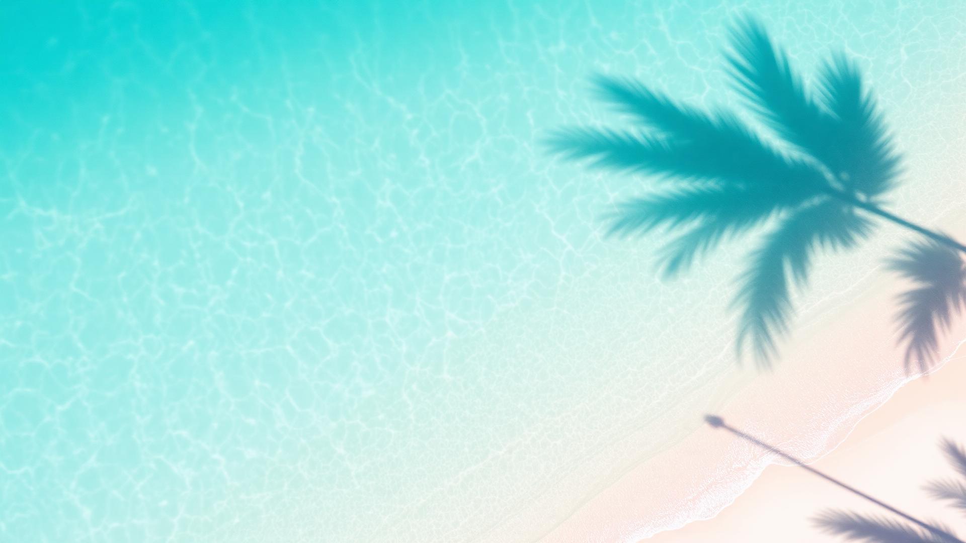 Sunlit turquoise Hawaiian lagoon with palm shadows on the shoreline